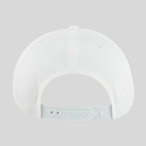 White baseball cap on a light gray background
